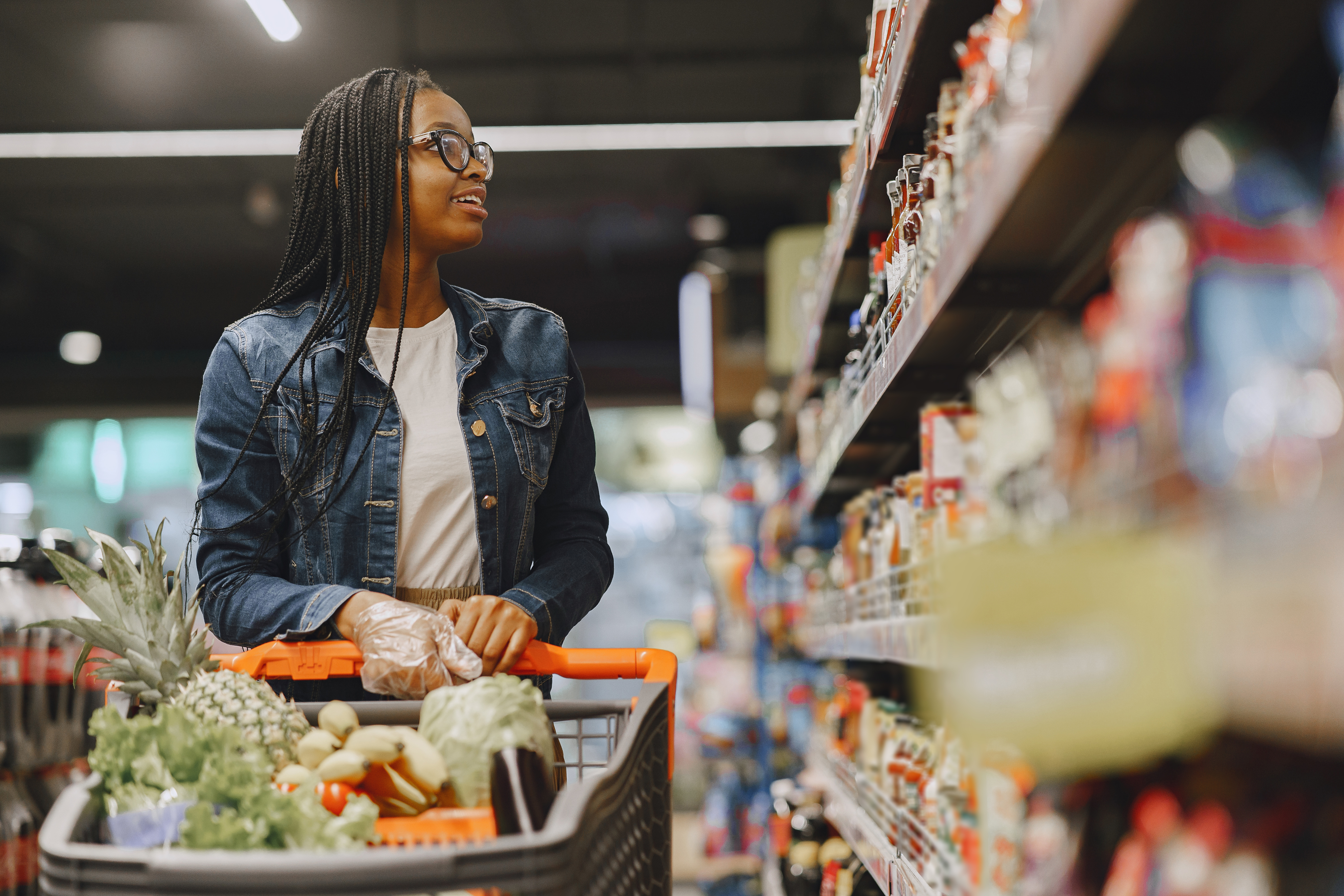 Shopper choosing produce